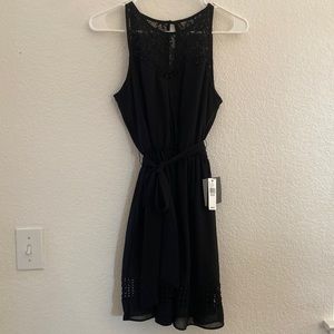 Dress, brand new with tags, black, size M, never worn. Lined with sheer overlay